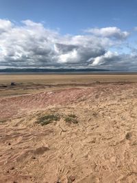 Scenic view of desert against sky