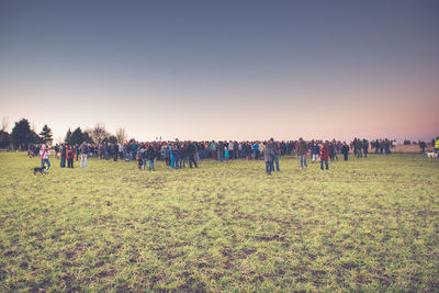 Panoramic view of people against clear sky