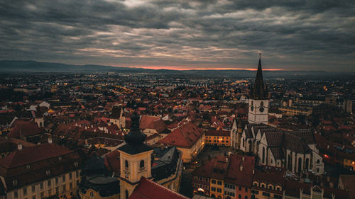 High angle view of townscape against sky during sunset