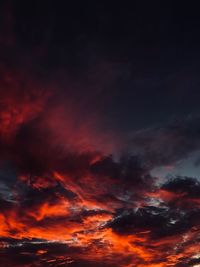 Low angle view of dramatic sky during sunset