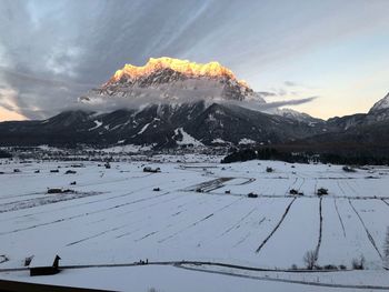 Scenic view of mountains against sky during winter