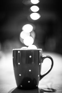 Close-up of coffee cup on table