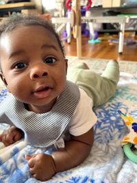 Portrait of cute baby girl at home