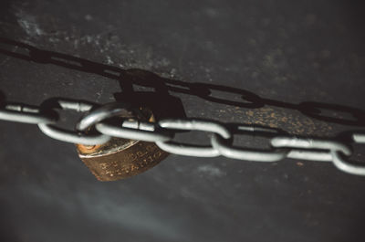 Close-up of padlock on chain