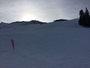 Scenic view of snow mountains against sky