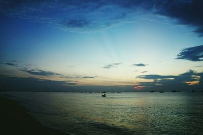 Scenic view of sea at sunset