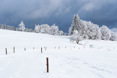 Scenic view of snow covered mountain against sky