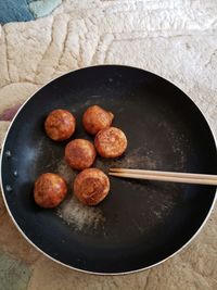 High angle view of eggs in cooking pan