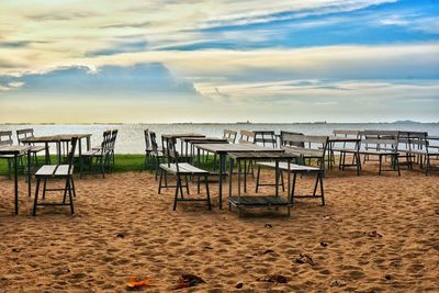 Chairs and tables on the sandy beach