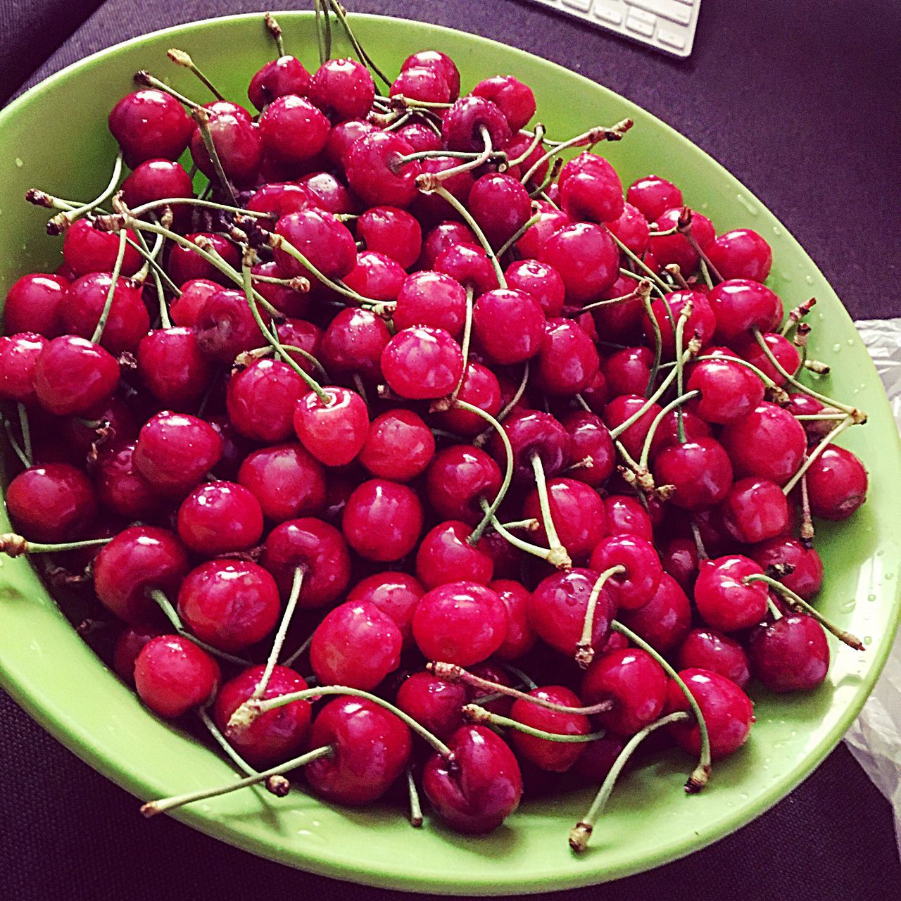 food and drink, food, fruit, healthy eating, freshness, red, strawberry, ripe, indoors, berry fruit, still life, cherry, large group of objects, abundance, juicy, high angle view, organic, bowl, raspberry, grape