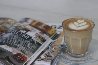 Close-up of coffee served on table