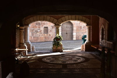 Empty interior with arched entrance