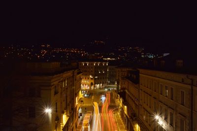 High angle view of illuminated city at night