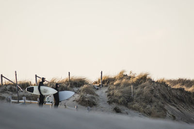 Looking at the winter surf from the dunes