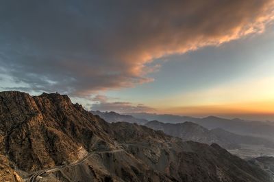 Scenic view of mountains against sky during sunset