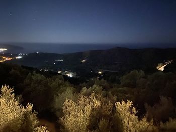 High angle view of illuminated city at night