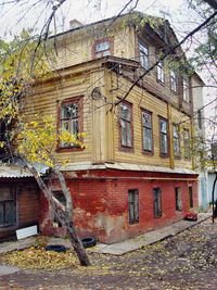 Exterior of abandoned house against sky