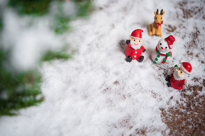 High angle view of christmas figurines on table