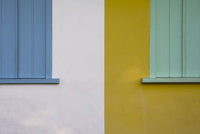 Close-up of closed windows on wall