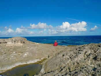 Scenic view of sea against blue sky