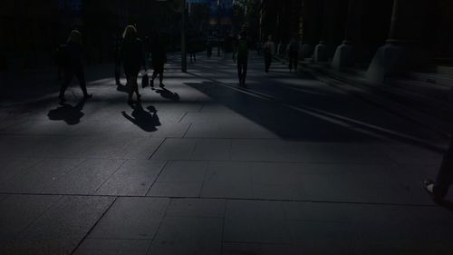 Woman standing at night