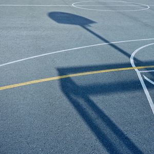 Shadows on the street basketball court