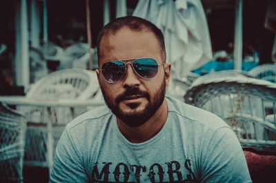 Portrait of young man wearing sunglasses