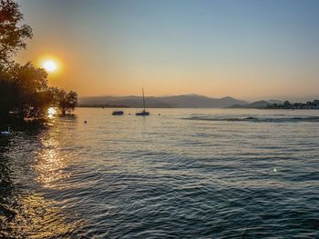 Scenic view of sea against sky during sunset