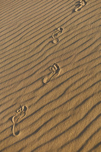 Full frame shot of steps on sand 