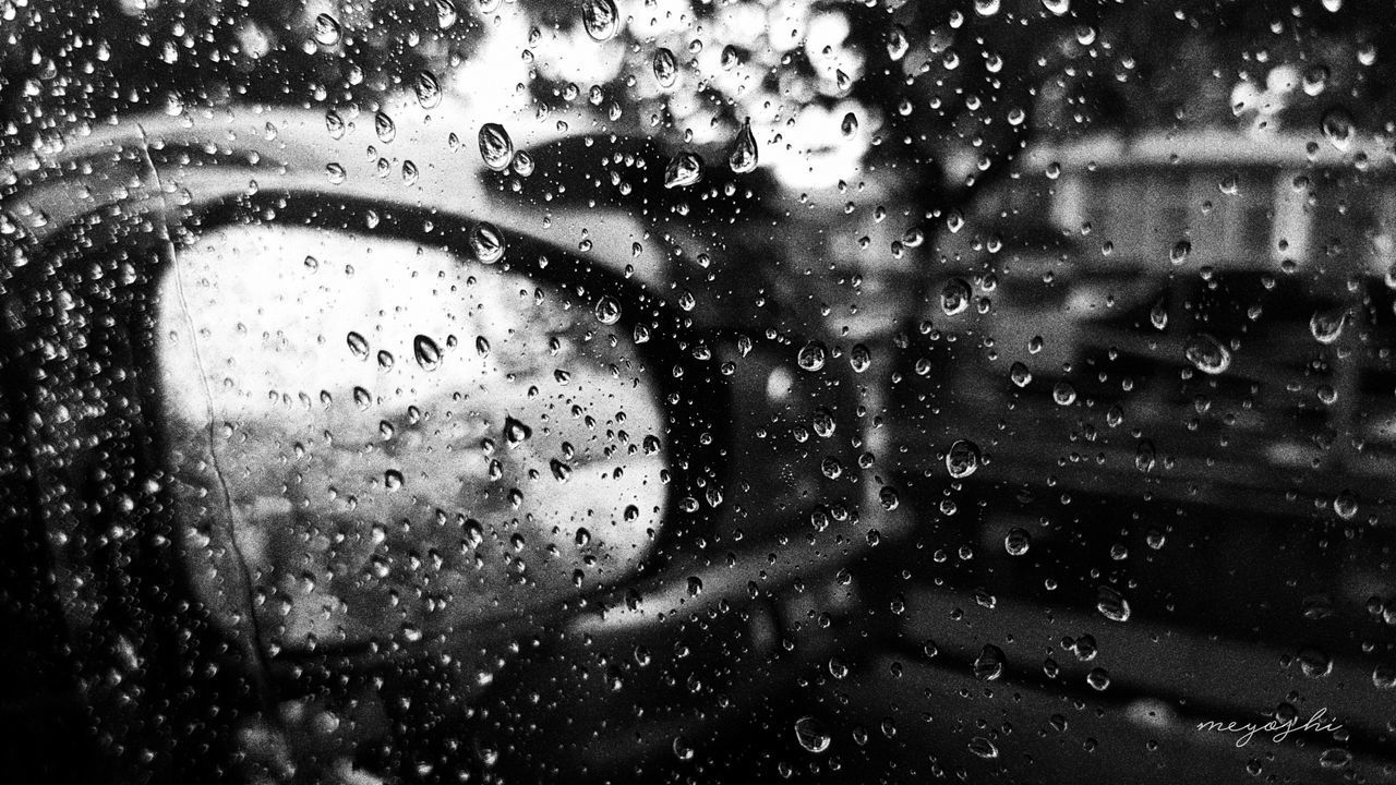 FULL FRAME SHOT OF RAINDROPS ON WINDOW