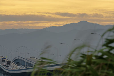 Scenic view of mountains against sky during sunset