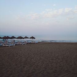 Scenic view of beach against sky