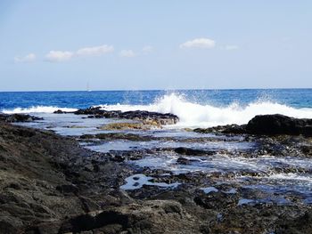 Waves splashing on rocks