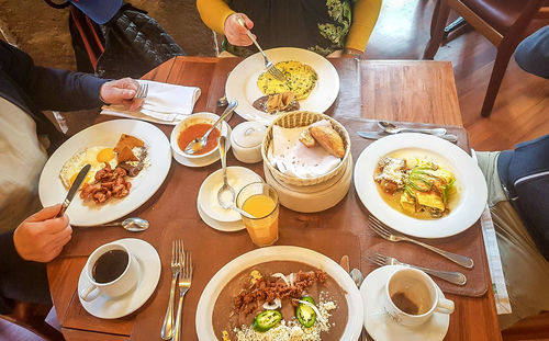 High angle view of people served in restaurant