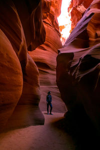 Full length of man standing on rock