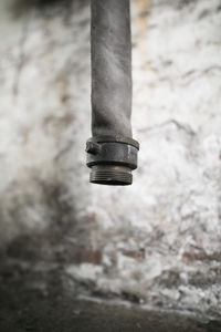 Close-up of pipe on wall