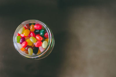 Close-up of multi colored candies on table