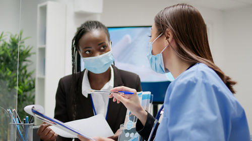 Female doctor working in laboratory