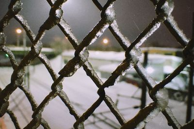 Full frame shot of chainlink fence during winter