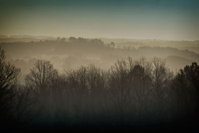 Scenic view of landscape against cloudy sky