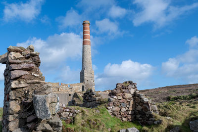 Landscape photo of an abandoned building from the mining industry on the cornish caost