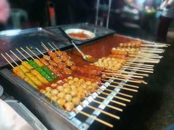 Close-up of meat on barbecue grill