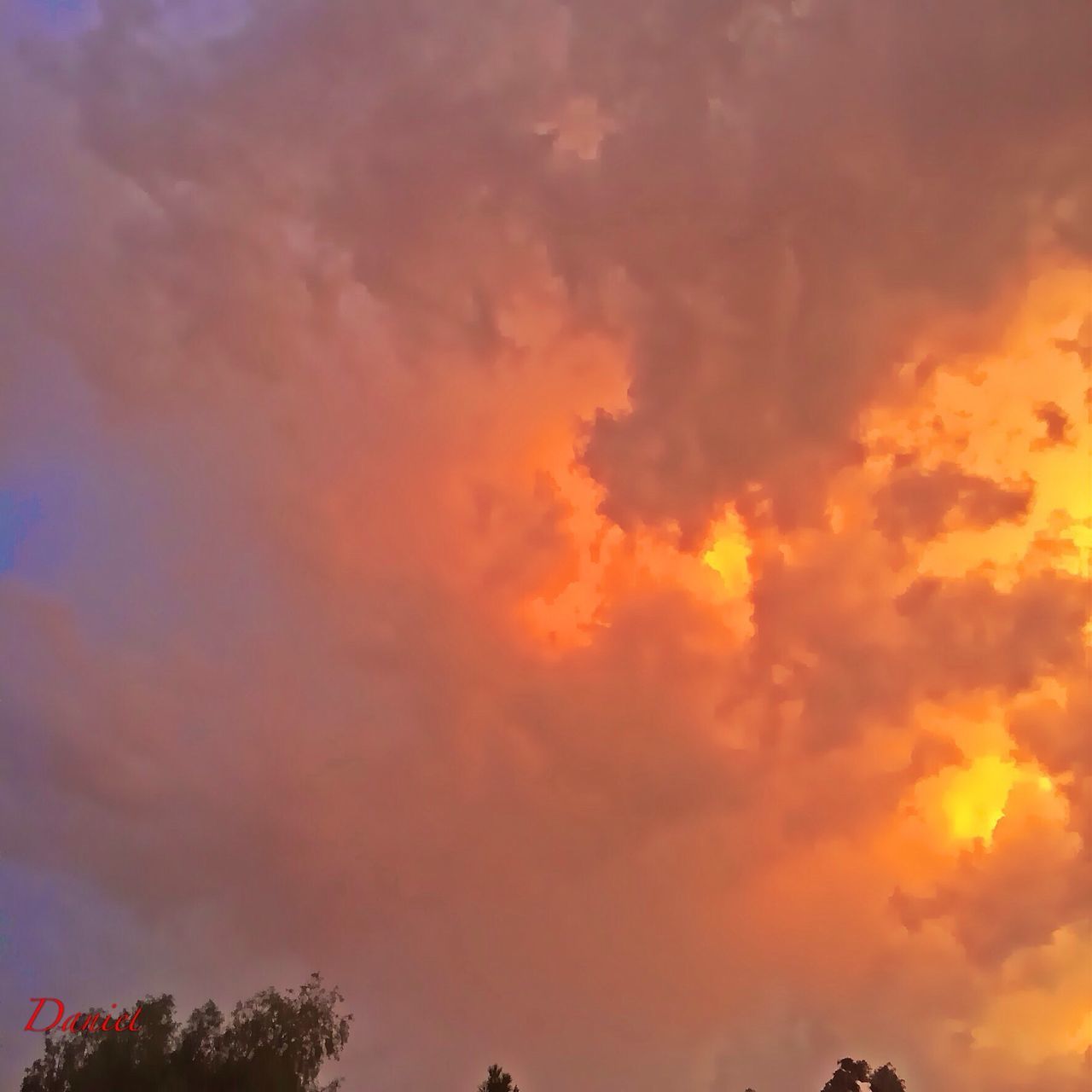 sunset, sky, orange color, beauty in nature, cloud - sky, scenics, low angle view, tranquility, tranquil scene, dramatic sky, nature, idyllic, cloudy, cloudscape, cloud, backgrounds, majestic, silhouette, sky only, outdoors