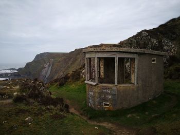 Abandoned building against sky