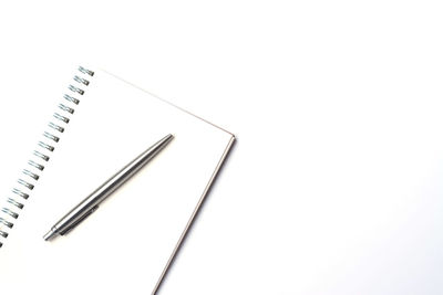 High angle view of pencil against white background