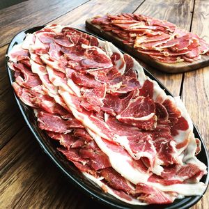 Close-up of meat in bowl on table