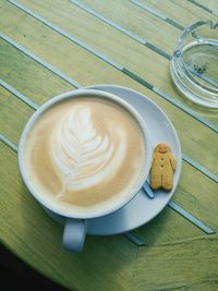 Close-up of cappuccino on table