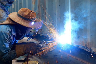 Men working on metal in workshop