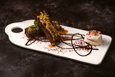 Close-up of chocolate cake in plate on table