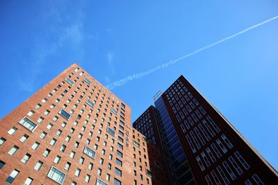 Low angle view of building against blue sky